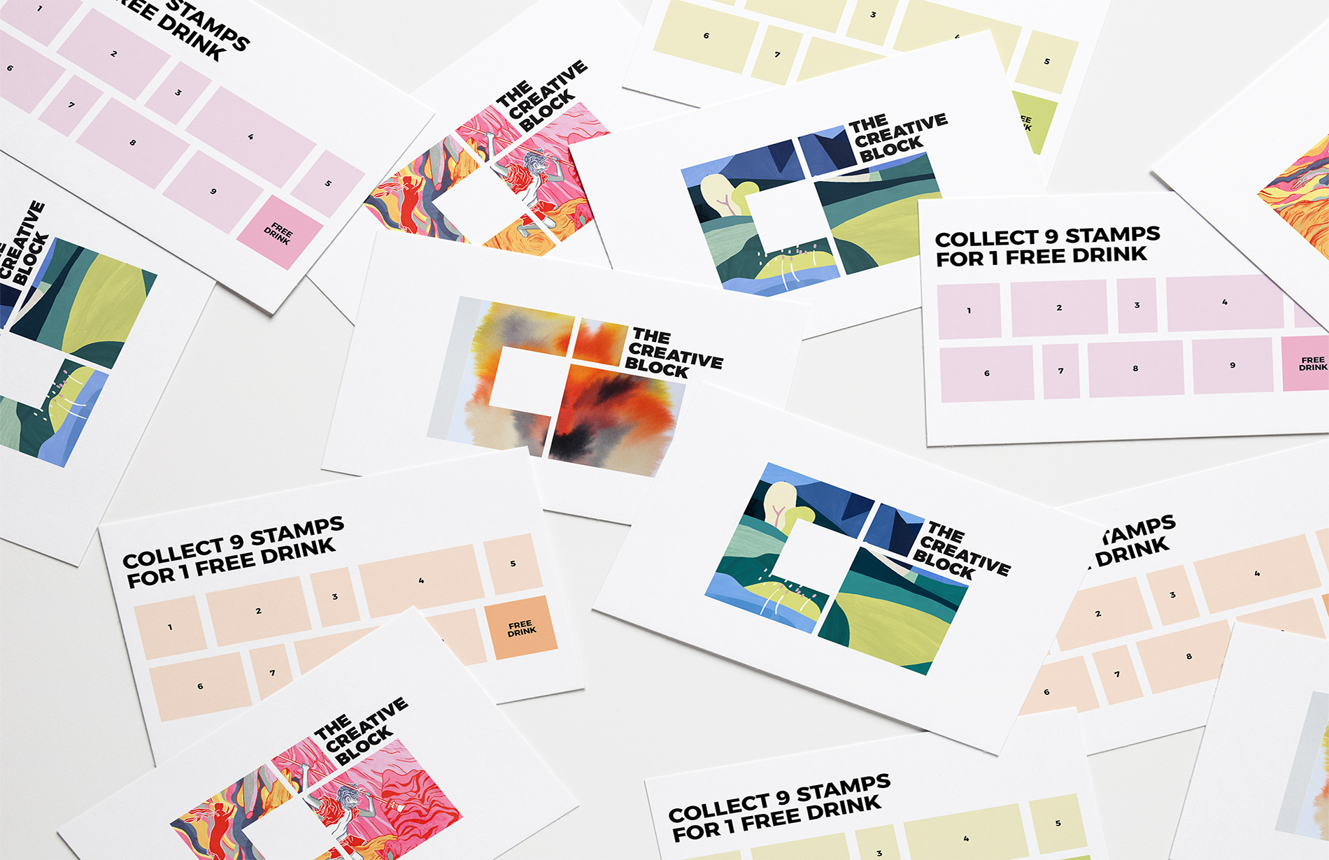 The Creative Block business stamp cards scattered on a white background showcasing the logo on the front of the card and stamp layouts on the back.